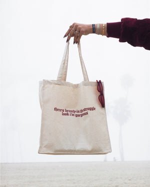 “THERE’S BEAUTY IN THE STRUGGLE, LOOK I’M GORGEOUS” TOTE BAG